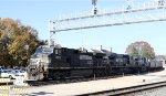 NS 9300 leads train 52X past the current passenger station and under the new signal bridge